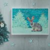 Christmas Hare in White Frame with Christmas Tree and Stars at Hush the Moon