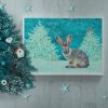 Christmas Hare in White Frame with Christmas Tree and Stars at Ornate Flair square